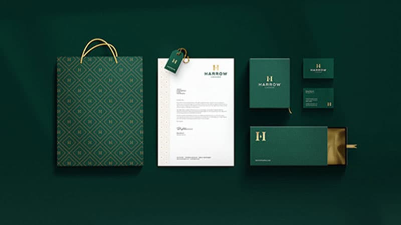 Harrow brand identity in dark green with a shopping bag, letterhead and cards