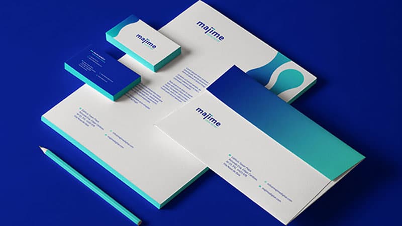 Majime brand identity with blue business cards and letterhead