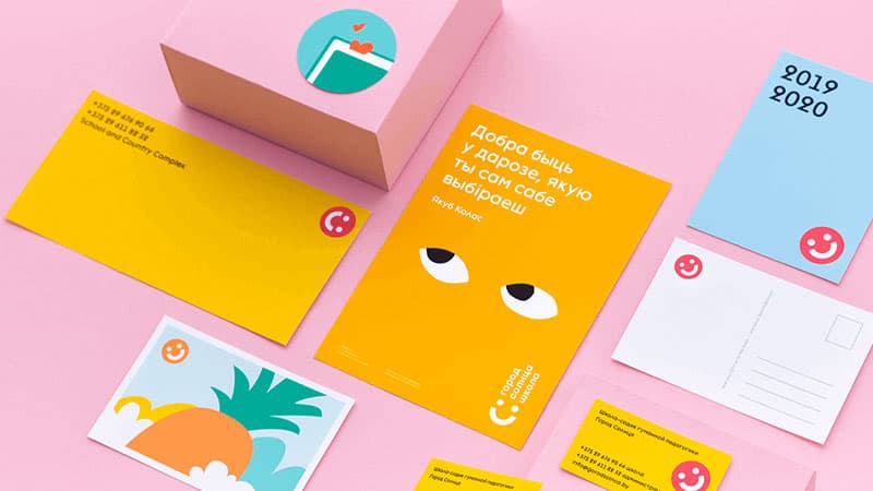 Playful brand identity with yellow envelopes and postcards