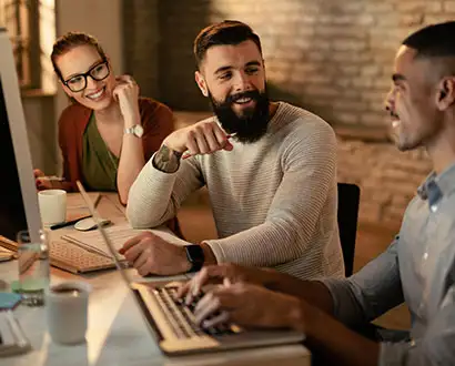 Designers presenting a concept on a laptop