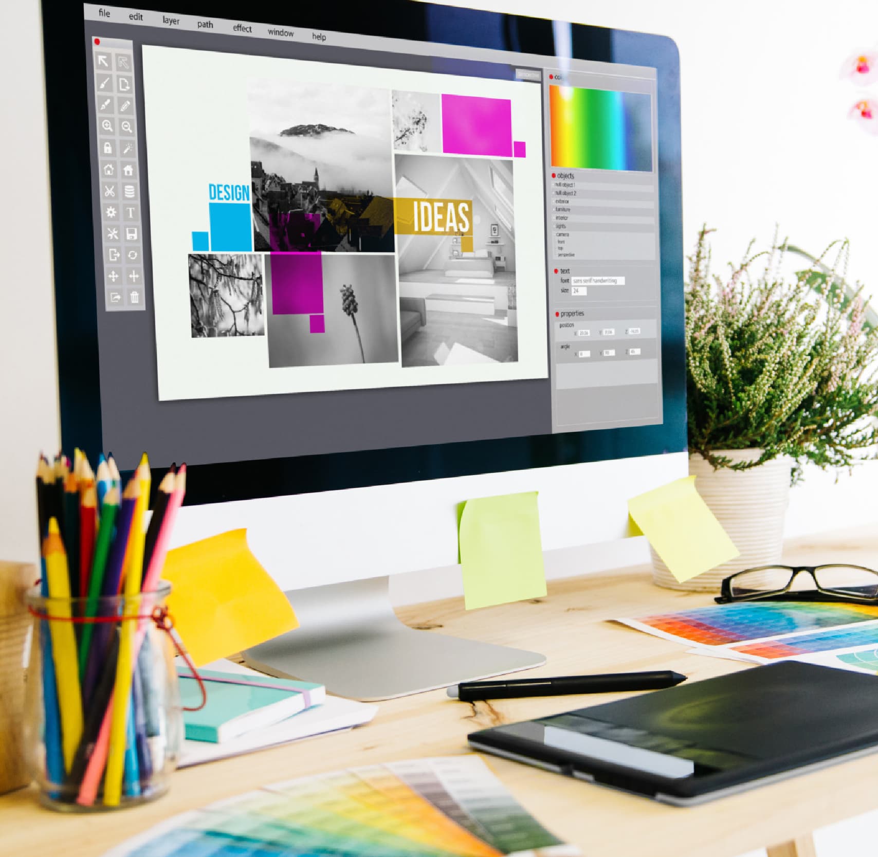Brand design workspace with mood boards and color swatches